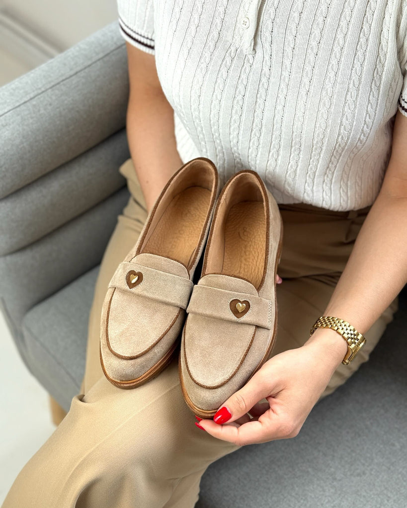 Beige women's leather loafers